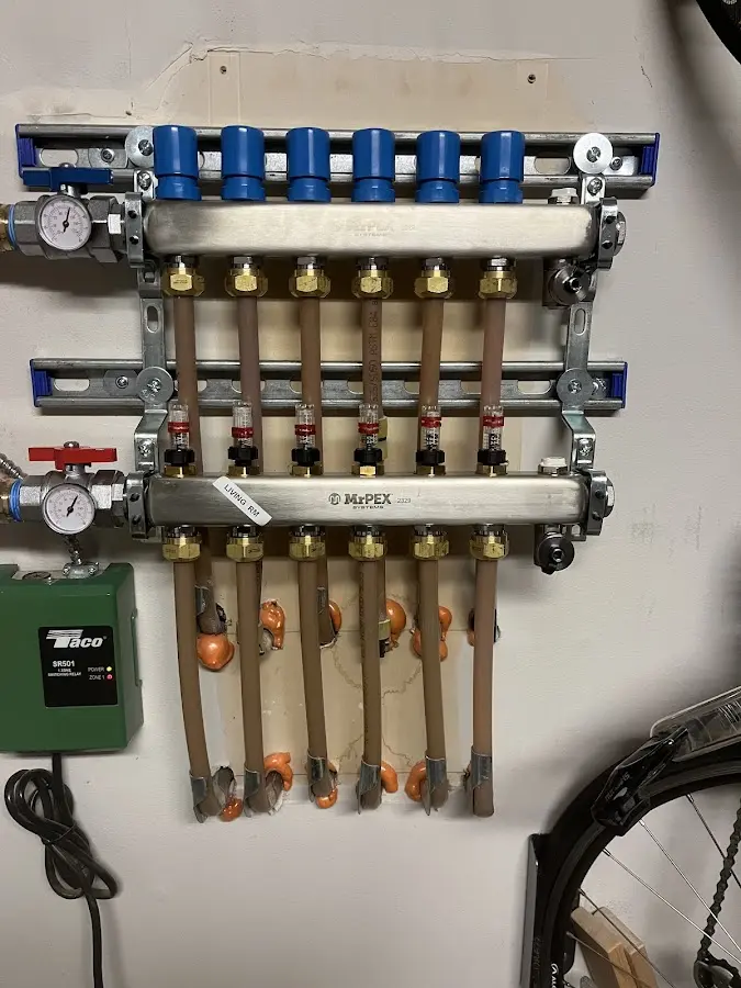 Plumber performing Water Heater Repair at a residential property in Wauconda